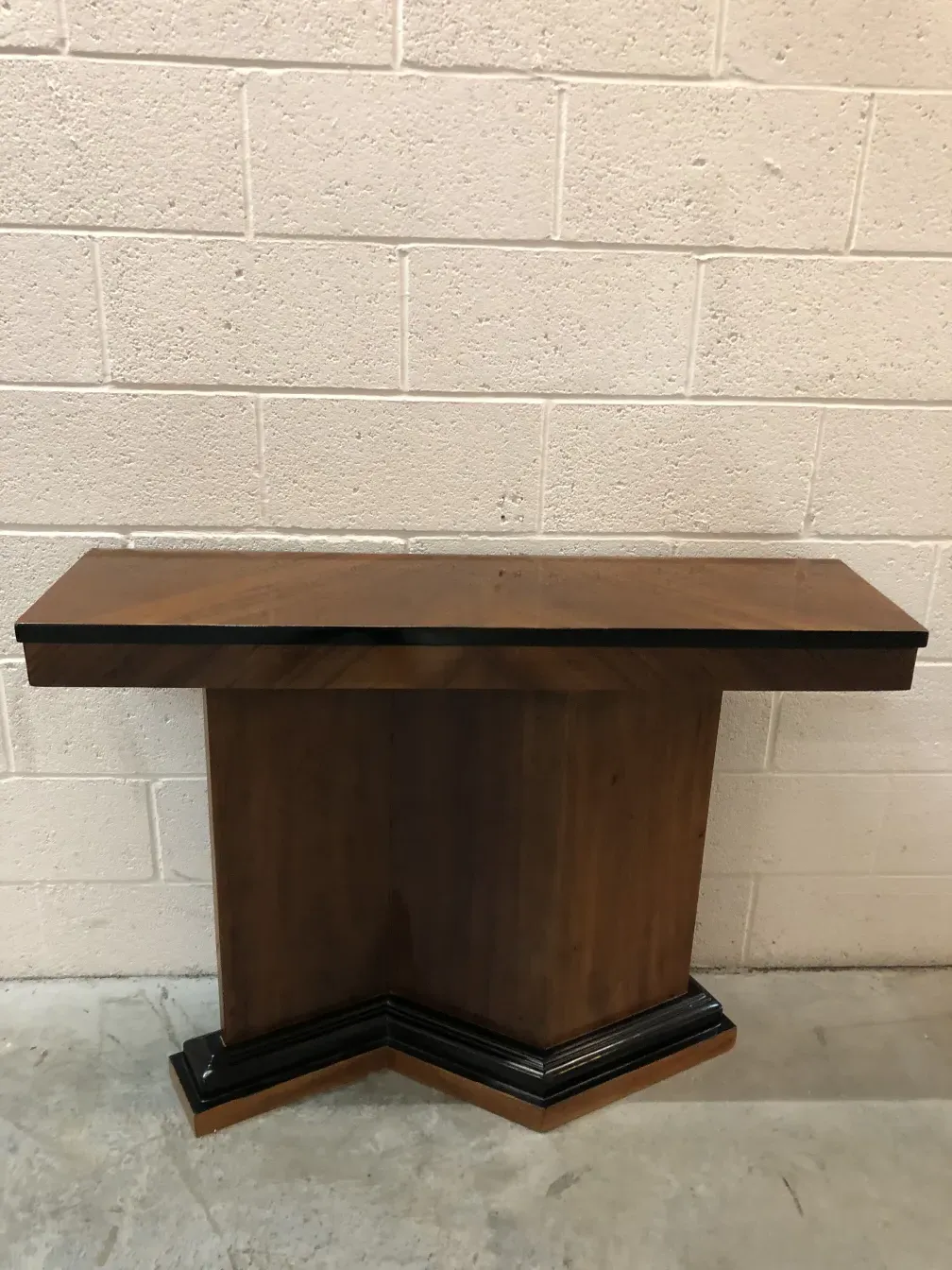 Two antique consoles with a classic and elegant design.