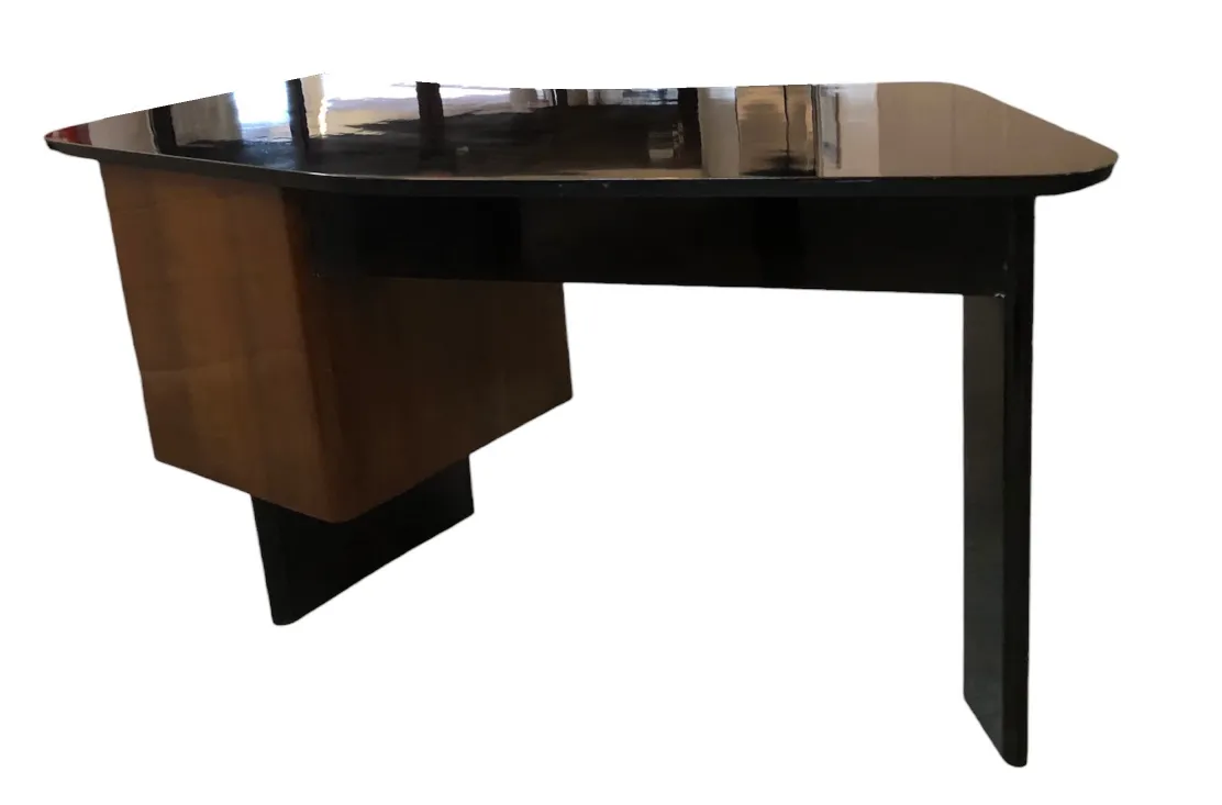 antique desk with shiny surface and straight legs