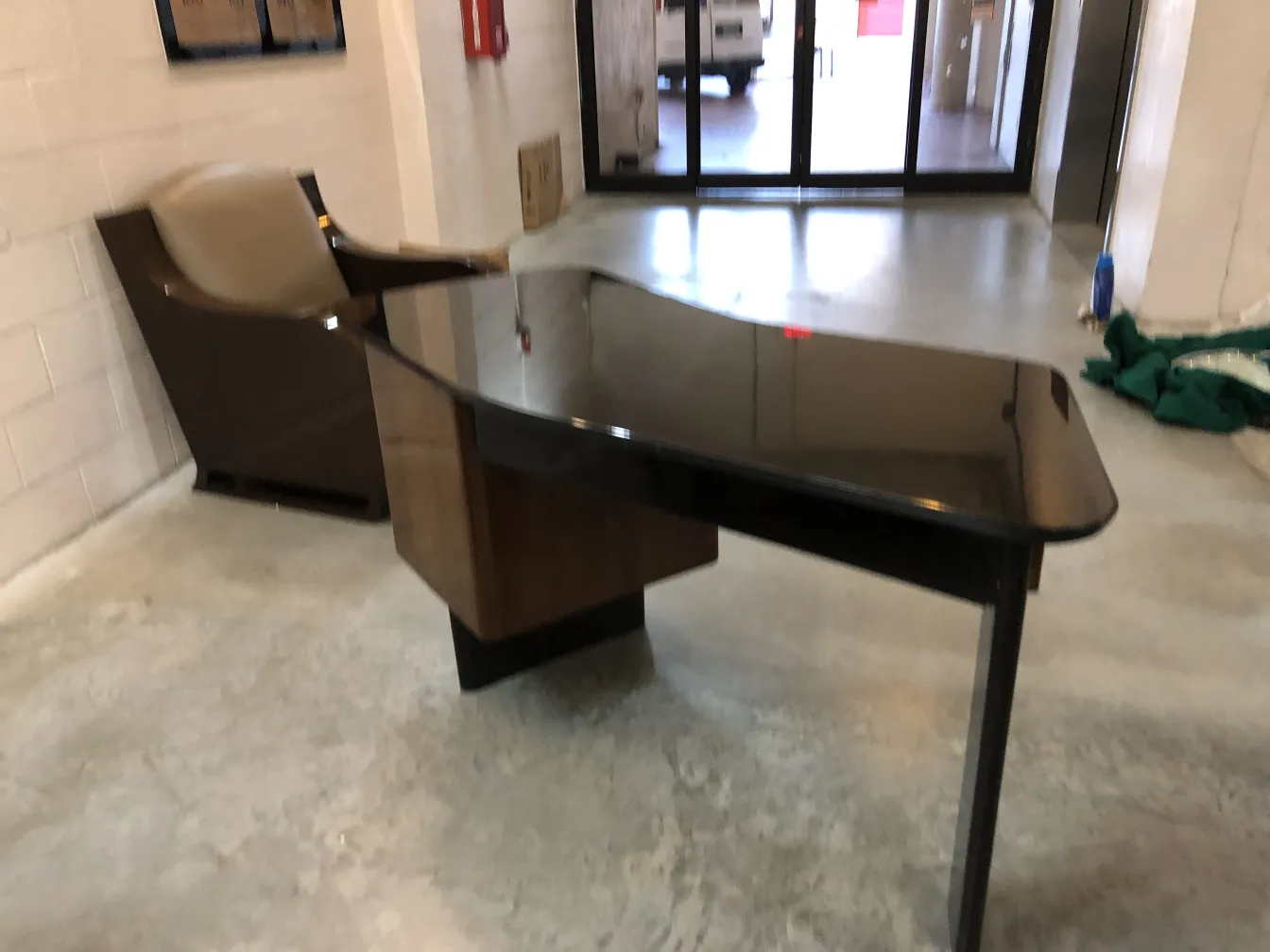 antique desk with modern design, dark color