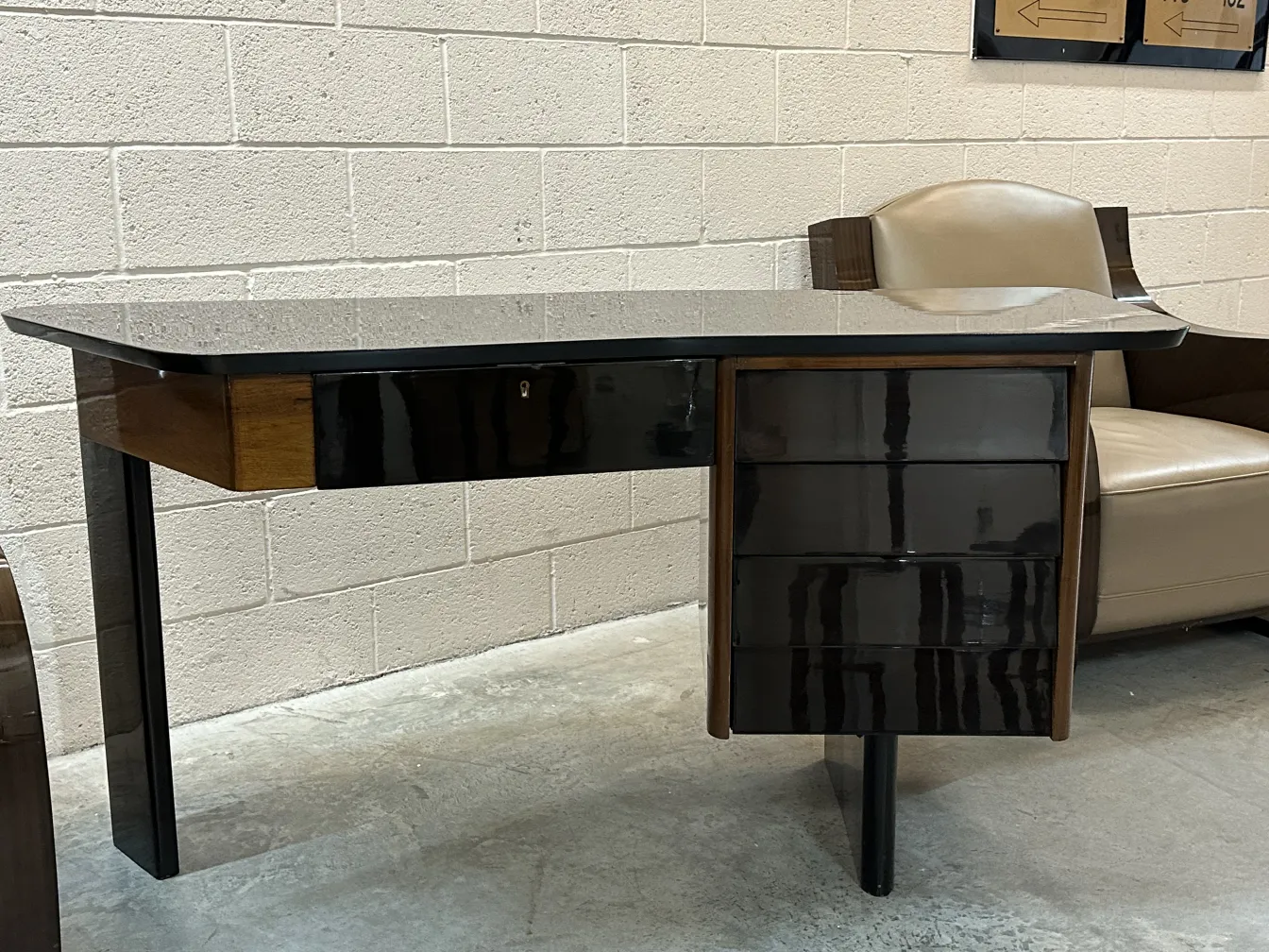 antique desk featuring black finishes and accents