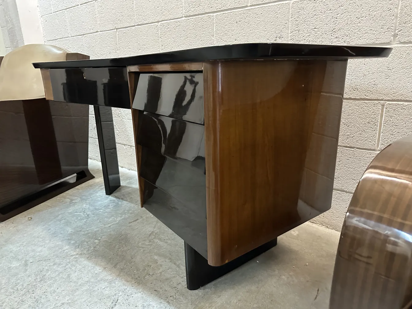 antique desk featuring elegant design with smooth finish