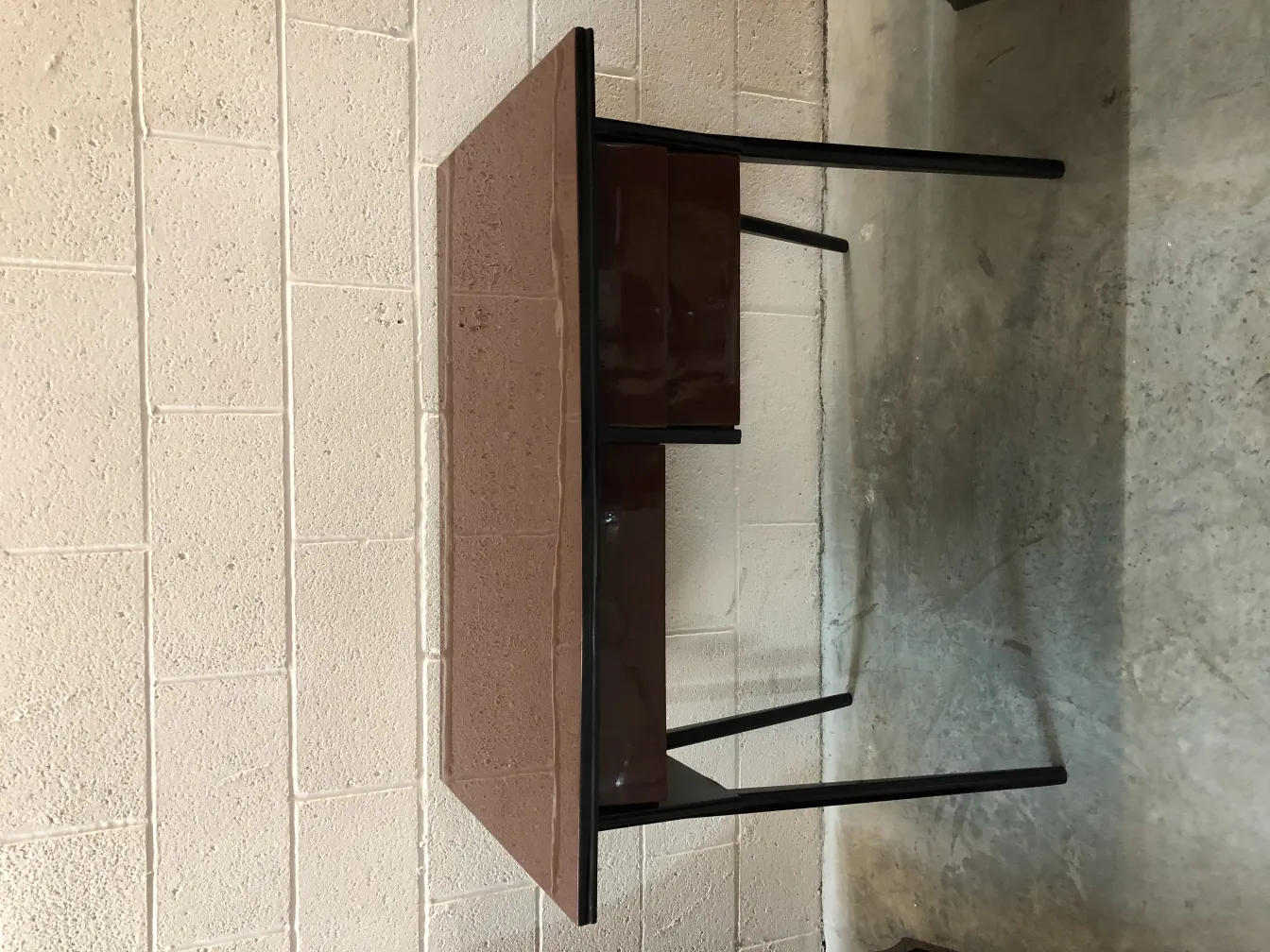 antique desk with a smooth surface and two drawers