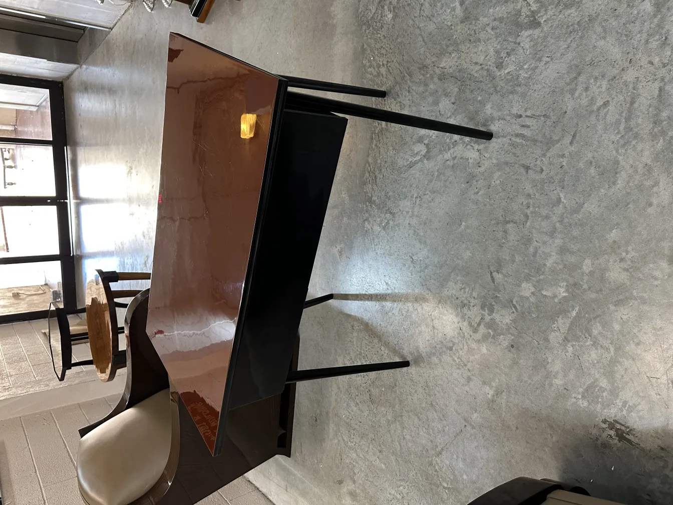 antique desk with black legs, office environment