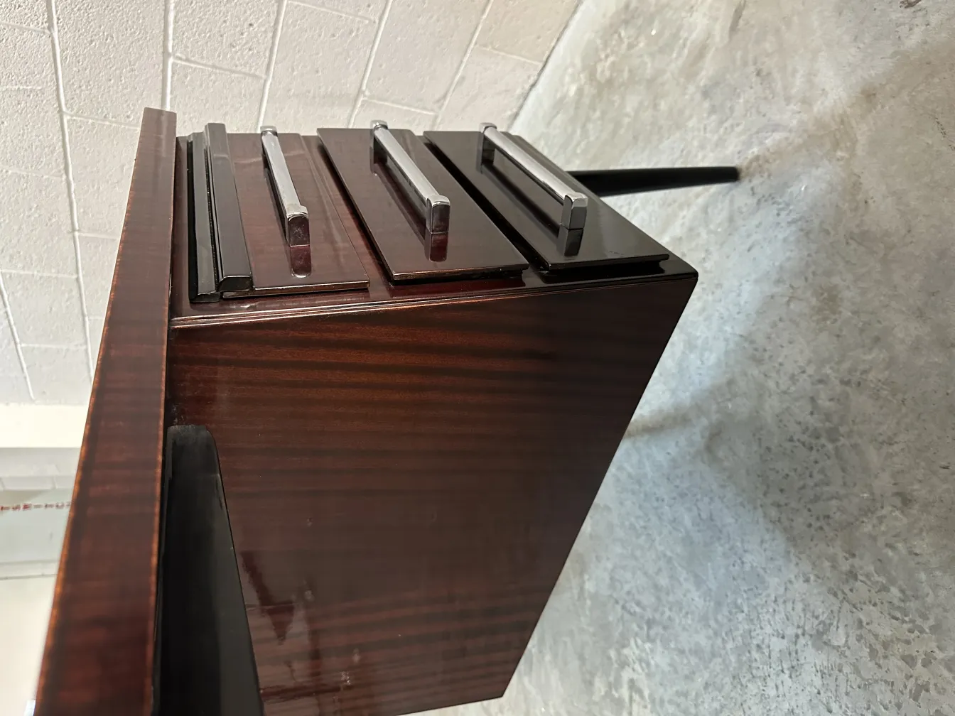 Top view of an antique desk with multiple drawers