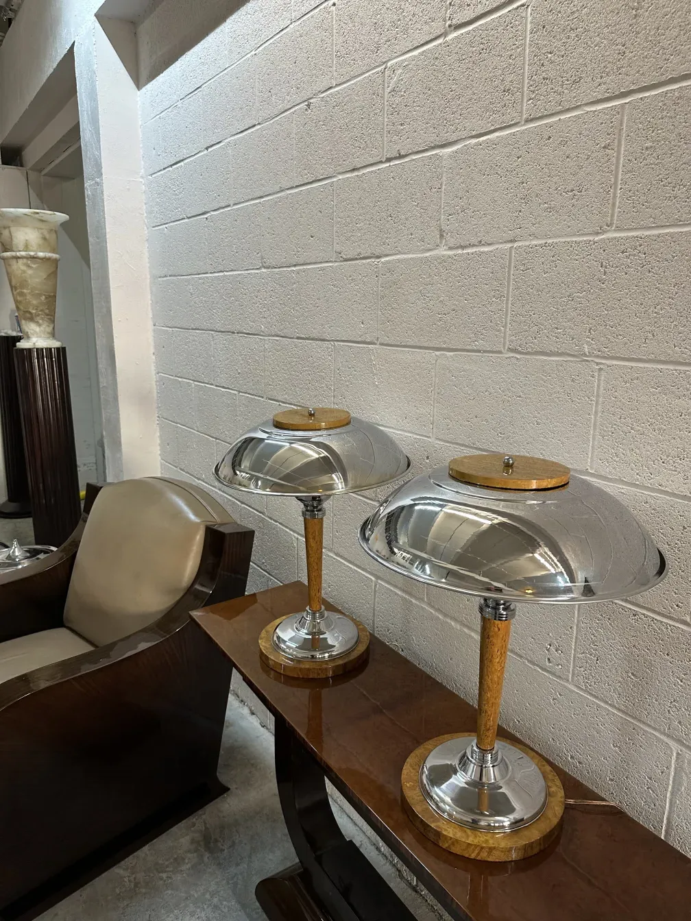 two elegant antique table lamps in a cozy setting.