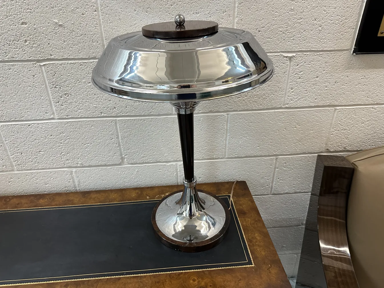 Two antique table lamps with elegant design and detailed base