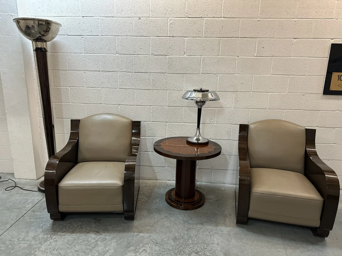 two antique table lamps beside a modern sofa