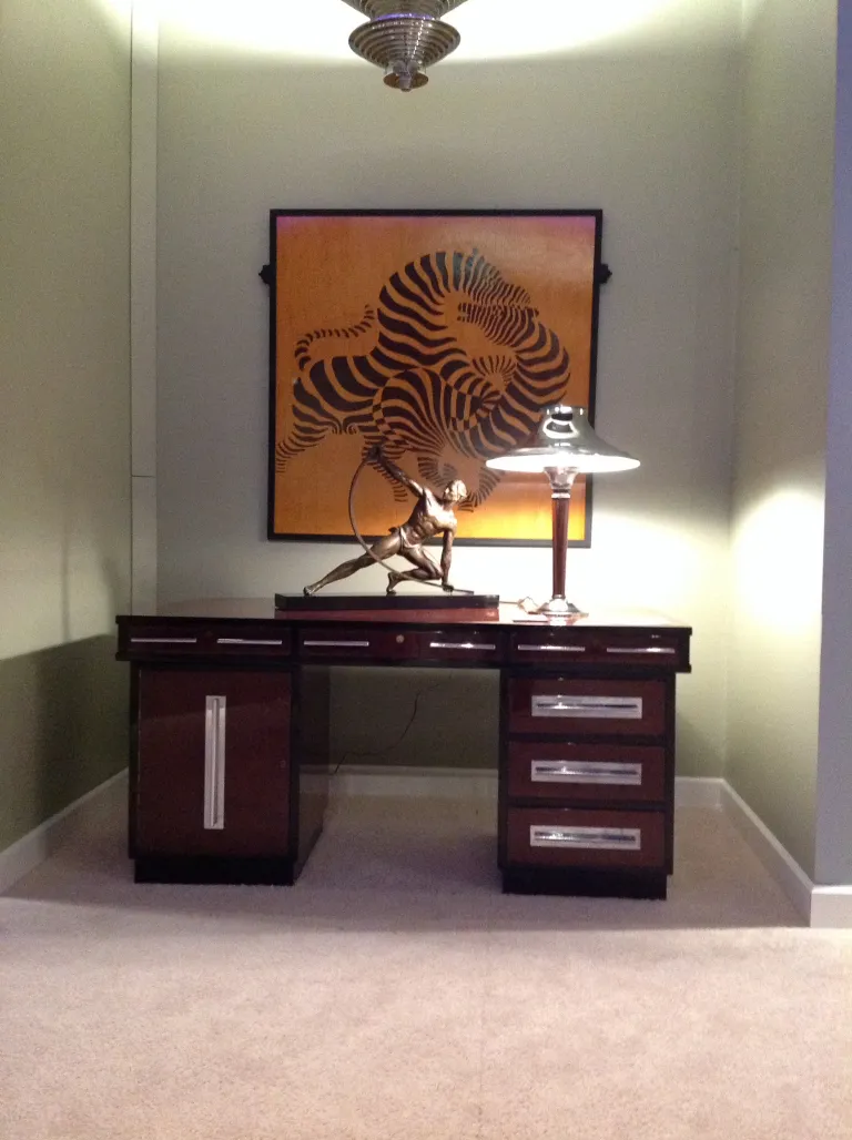 Antique table lamp with unique design in an elegant setting.