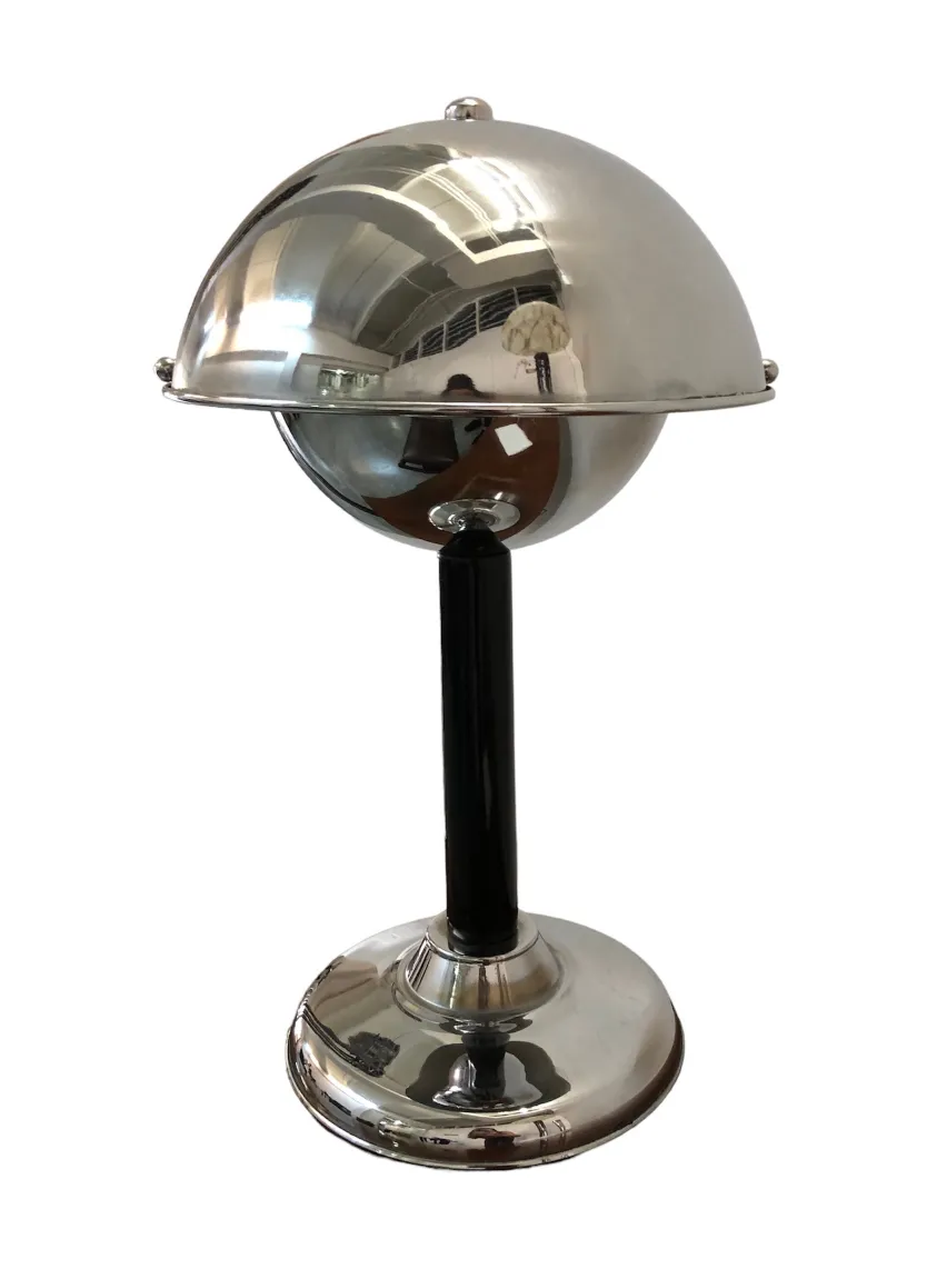 antique table lamp with spherical design and shiny base