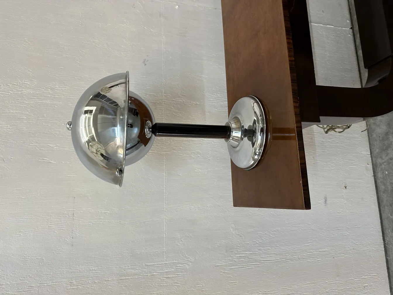 antique table lamp with elegant design, round base and shiny shade, perfect for any setting