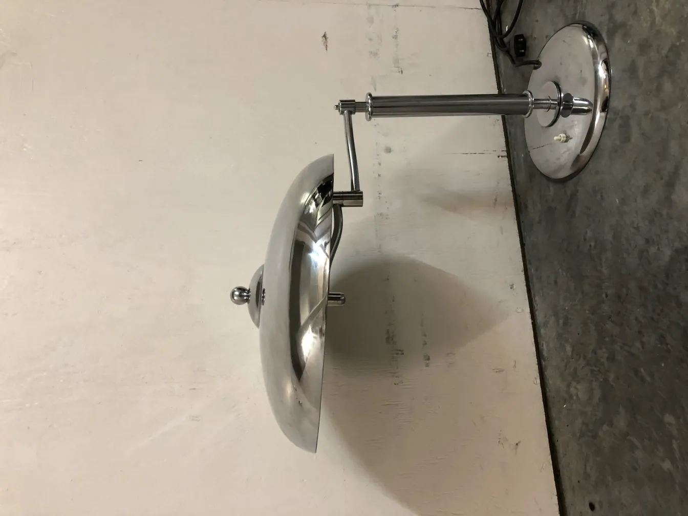 antique table lamp with shiny base in a simple setting