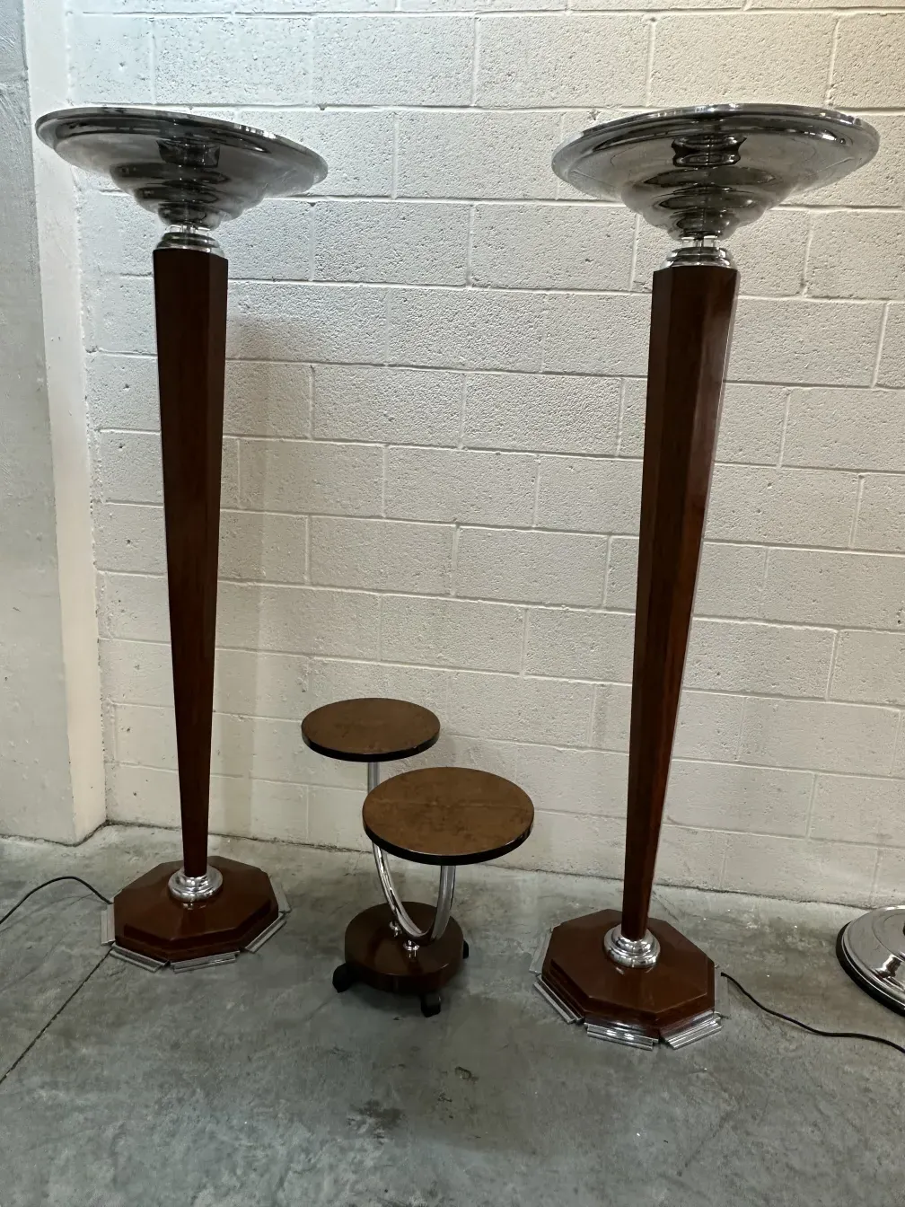 2 antique floor lamps in an elegant setting