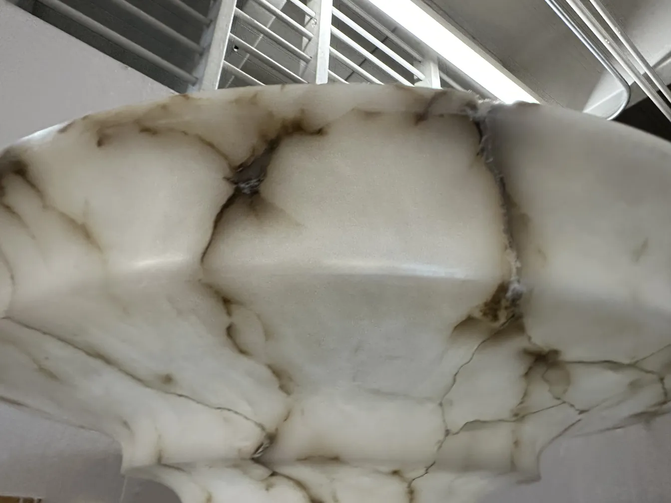 two antique floor lamps with distinct details