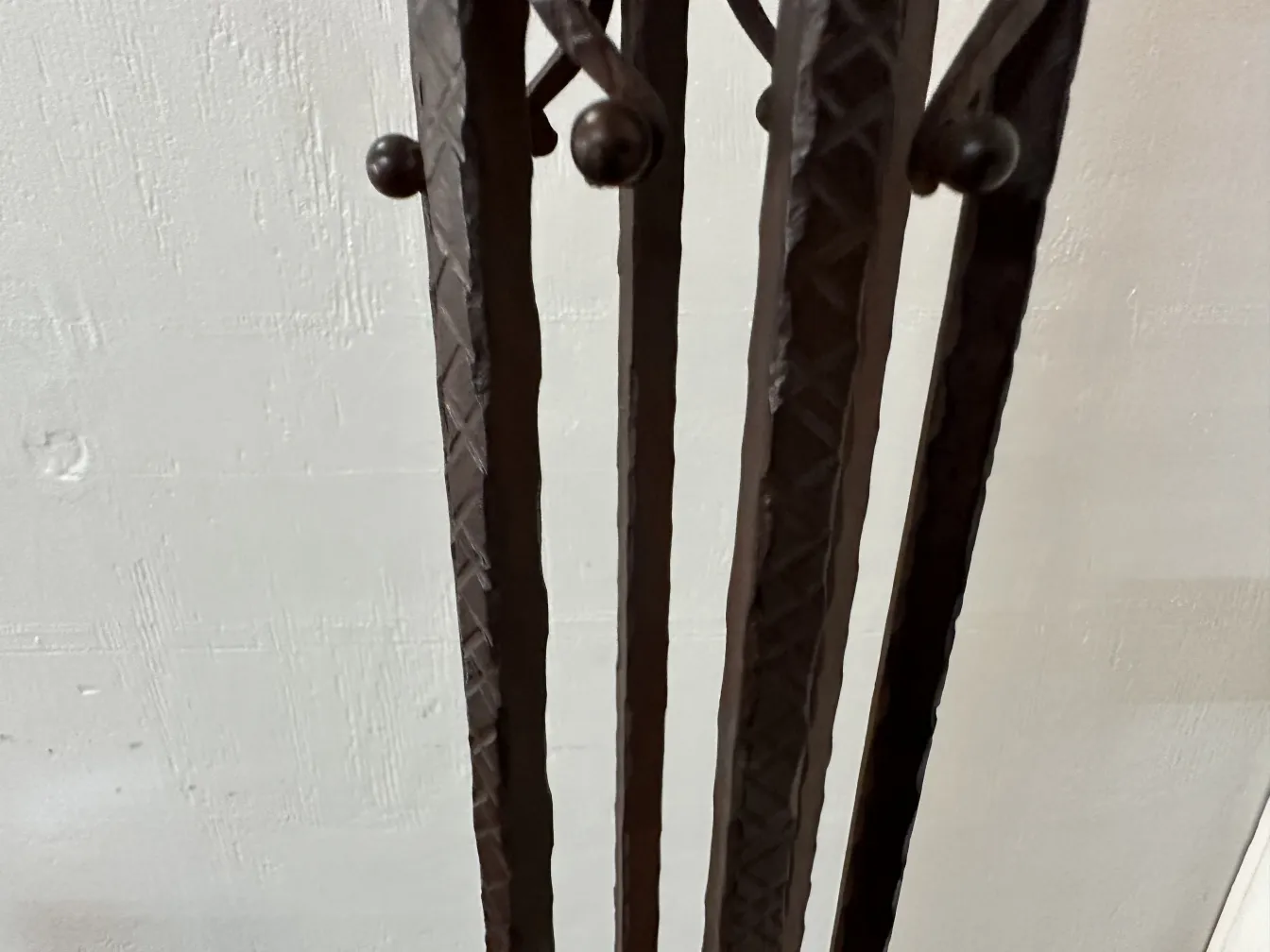 Antique floor lamps with intricate design, set in a classic environment.