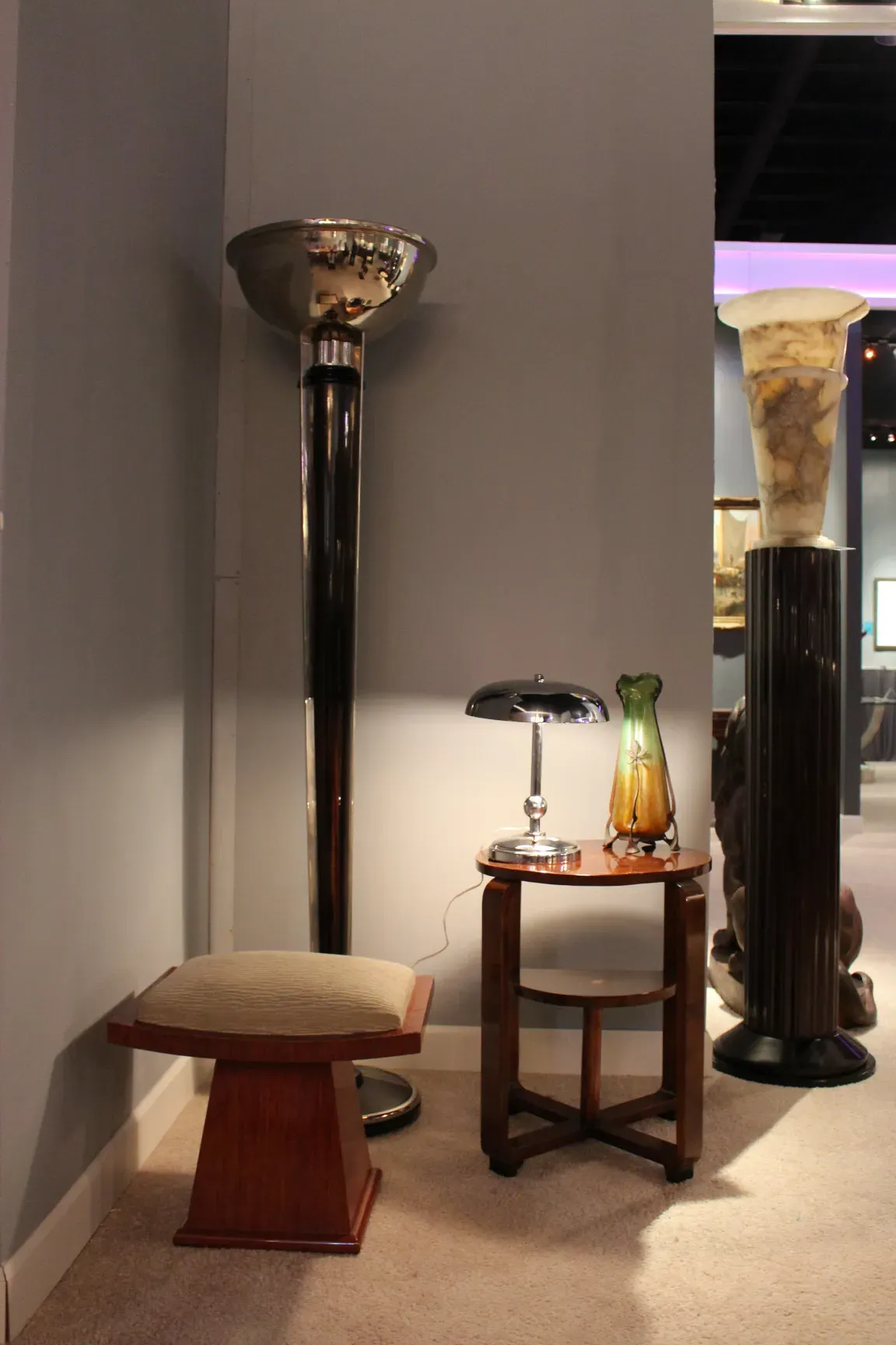 Two antique floor lamps in a cozy environment