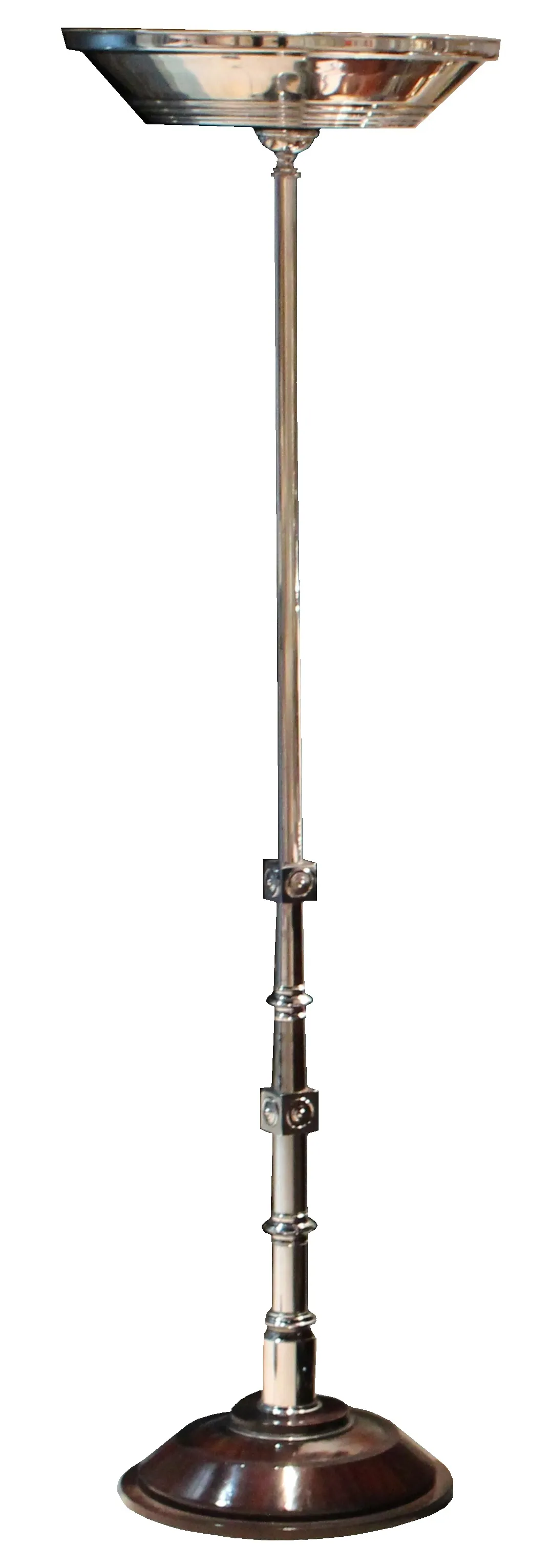 Two antique floor lamps with decorative bases and elegant stems, cozy setting.