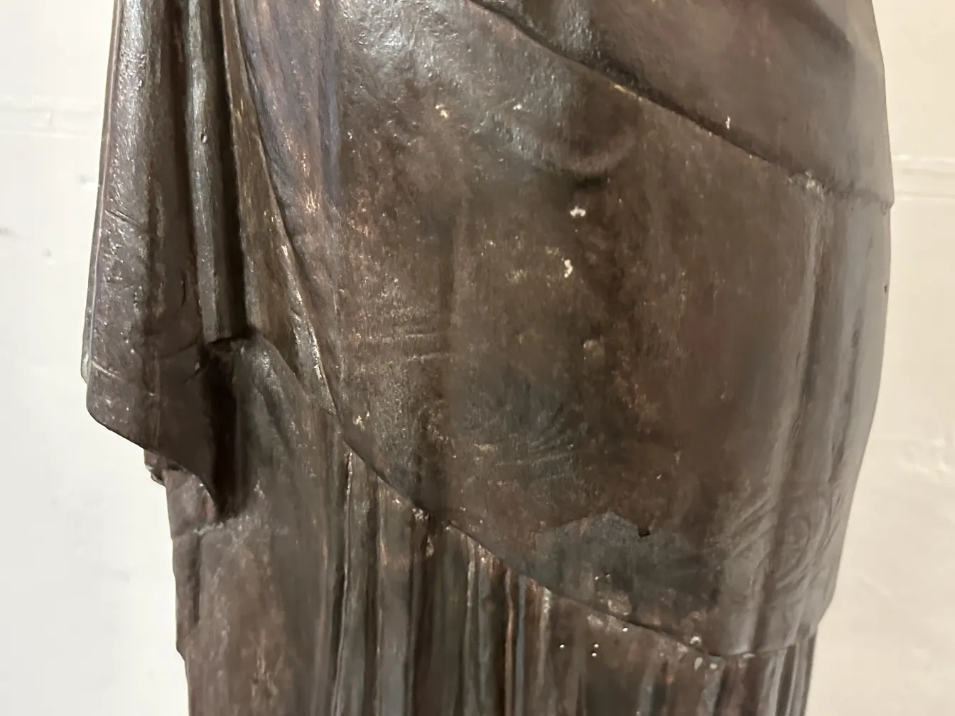 Detail of 2 antique floor lamps in a decorative setting