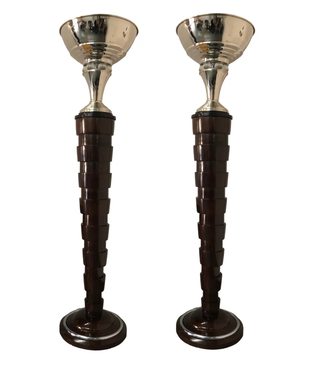 two antique floor lamps with distinctive base in a cozy setting
