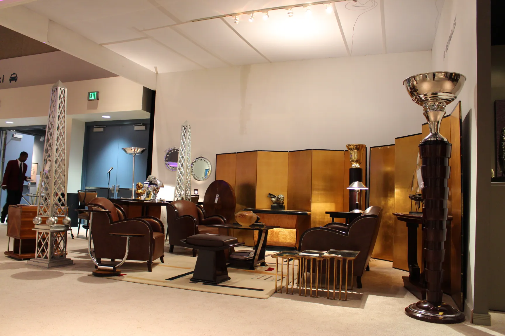 Two antique floor lamps in an elegant setting.