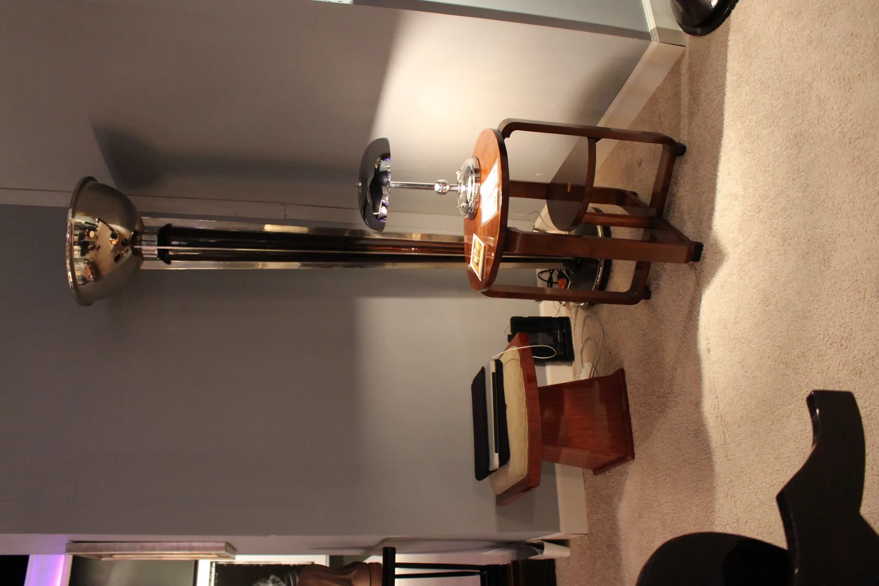 two antique floor lamps with shiny details in a cozy setting