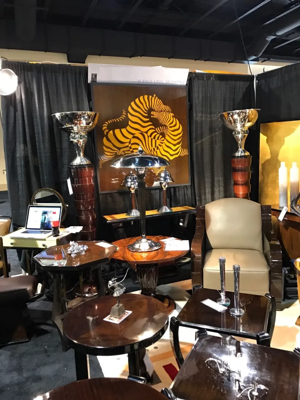 Two antique decorative floor lamps in an elegant setting.