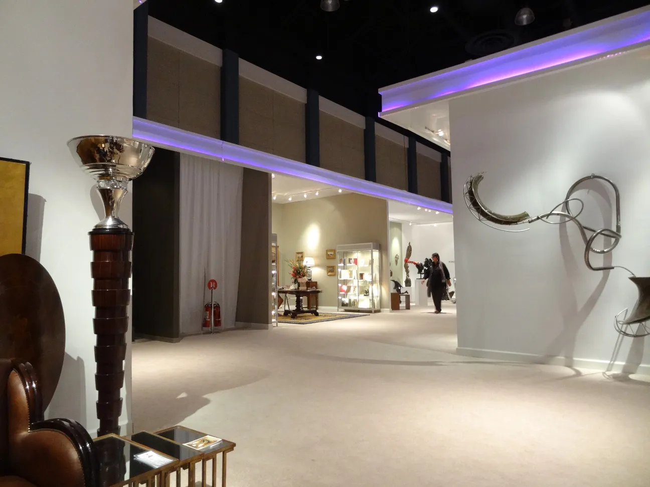 two antique floor lamps in a modern room