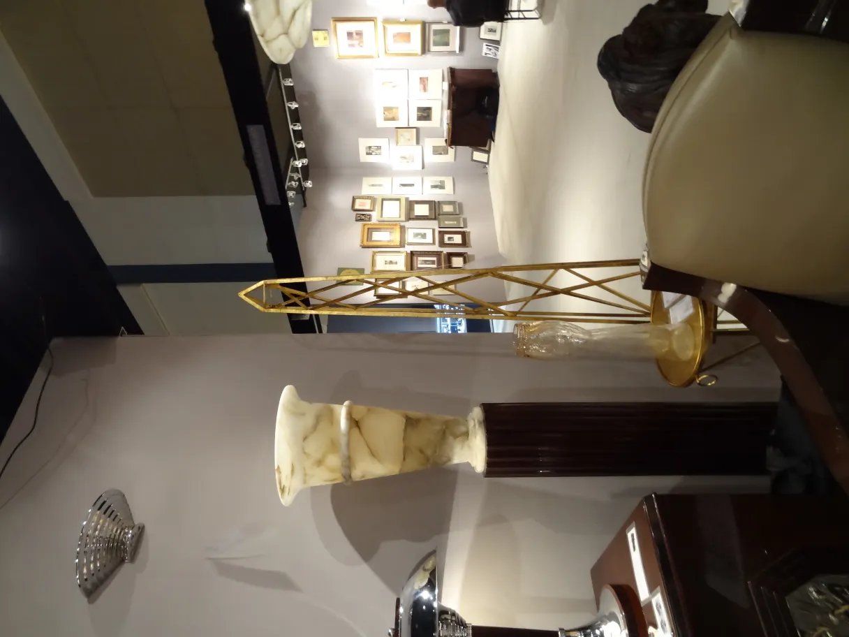 two antique floor lamps with elegant design in a cozy setting