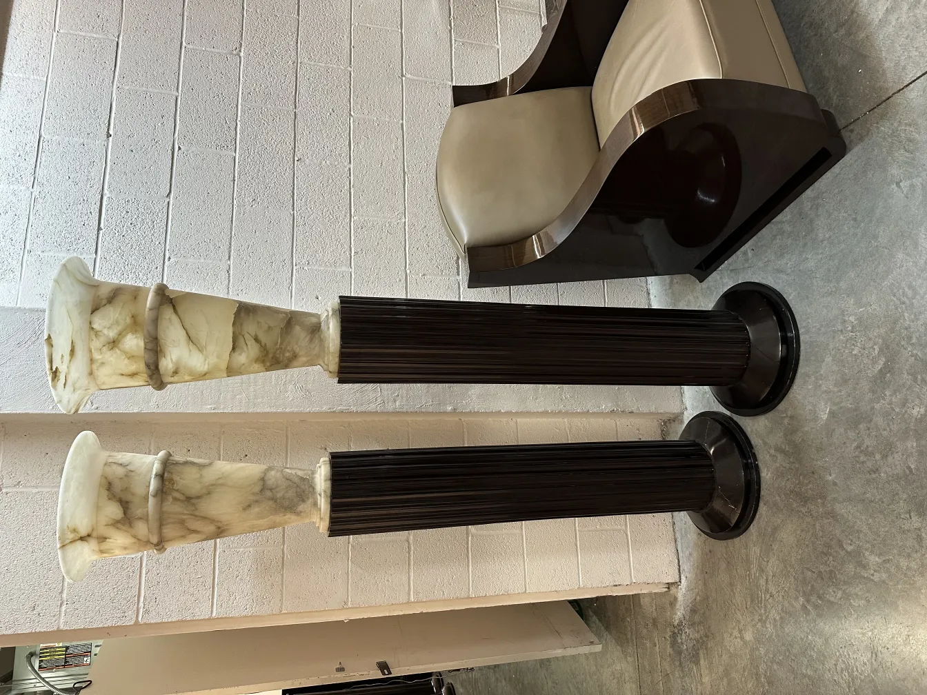 image of 2 antique floor lamps with decorative details in a neutral setting