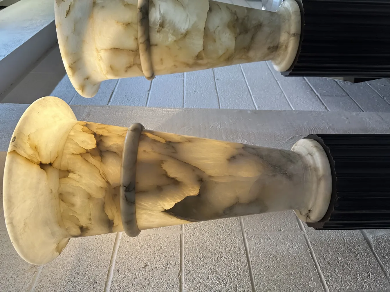 Two antique floor lamps with stylish bases