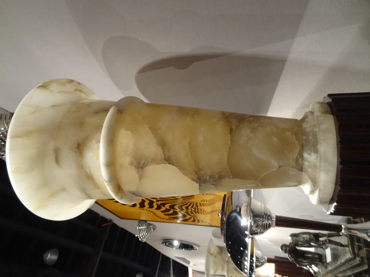 two antique floor lamps with sculptural details, decorative