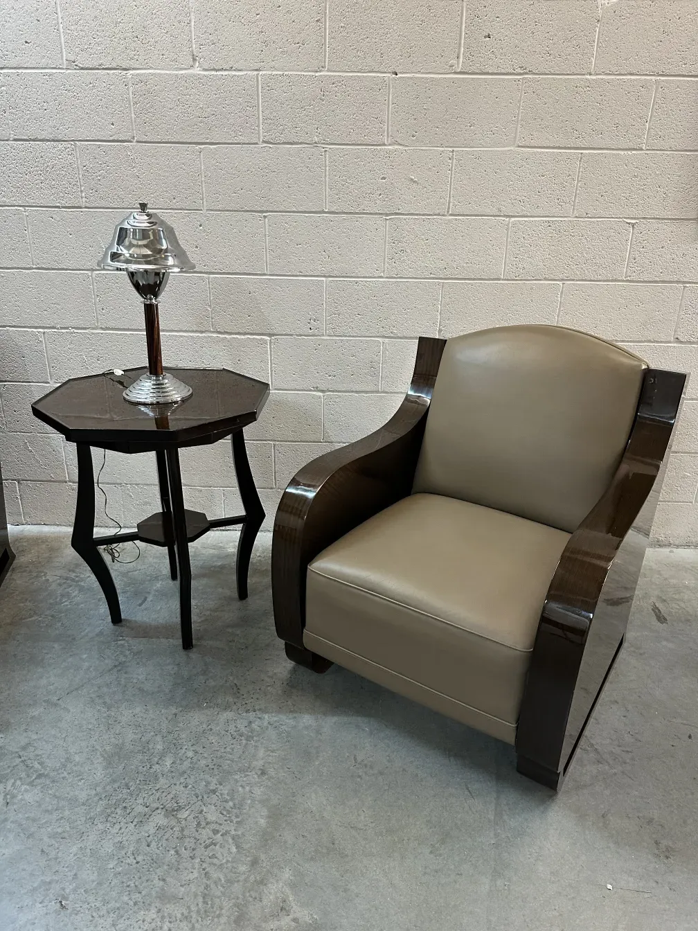 two antique armchairs in a neutral and elegant setting