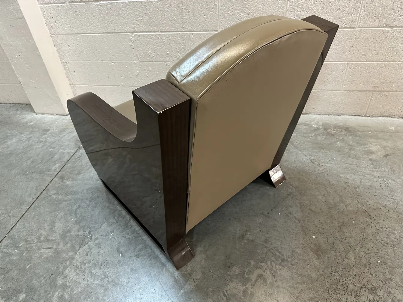 Side view of two antique armchairs in a modern setting