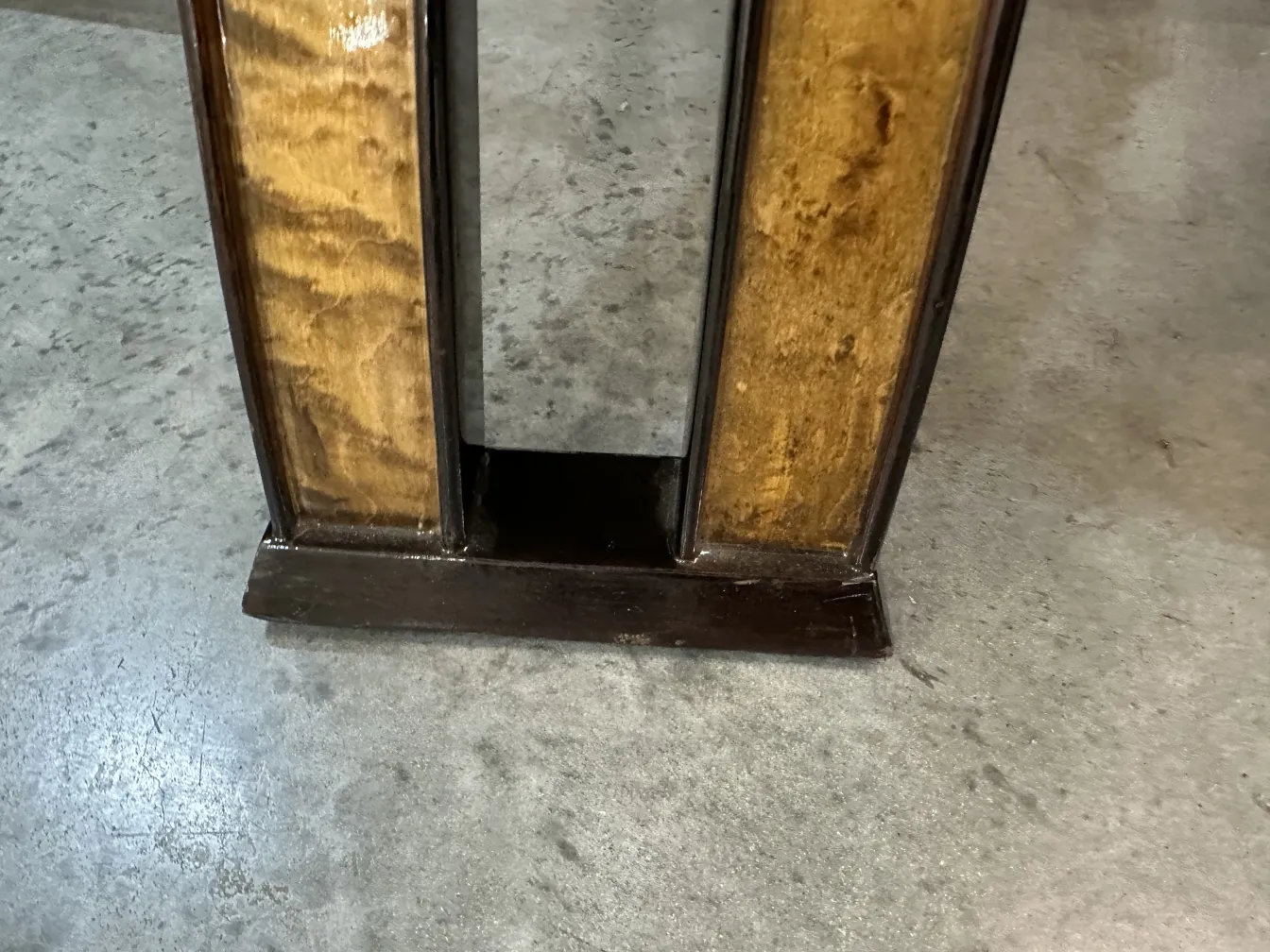 antique coffee table with straight legs in a neutral setting