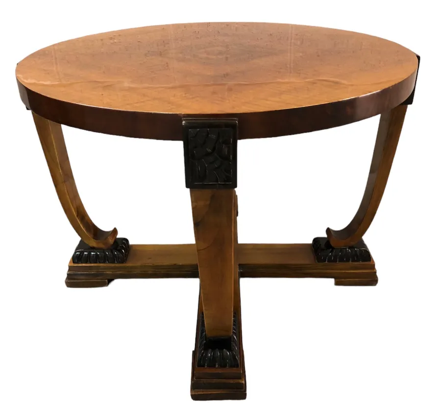 Mesa ratona antigua de forma redonda con patas elegantes en color claro