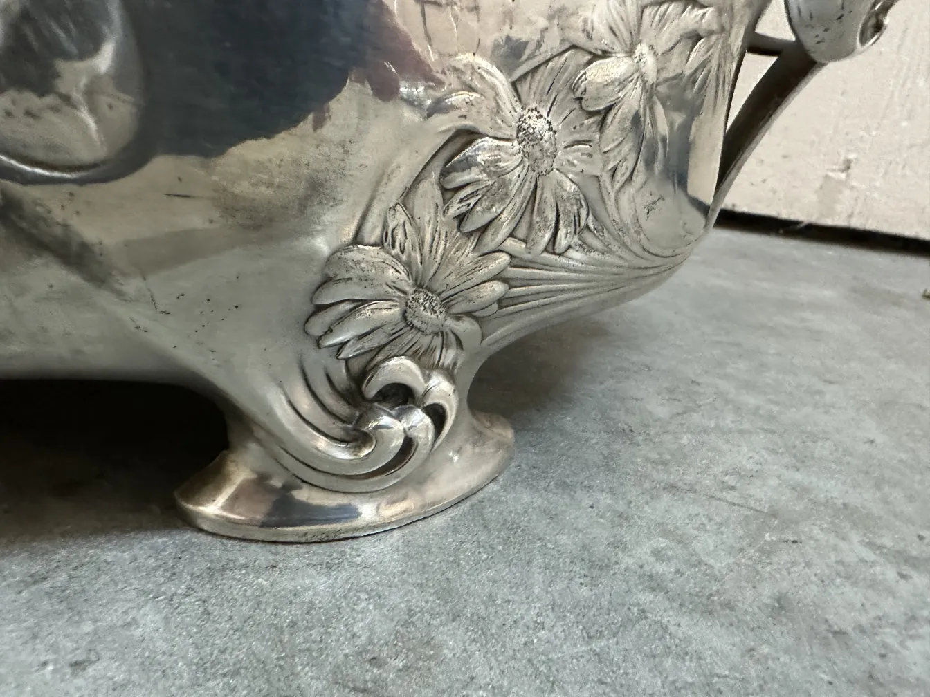 antique centerpiece featuring floral designs