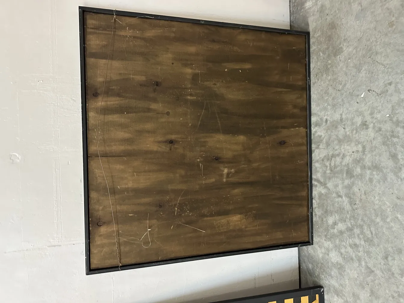 antique marquetry with black frame on light background