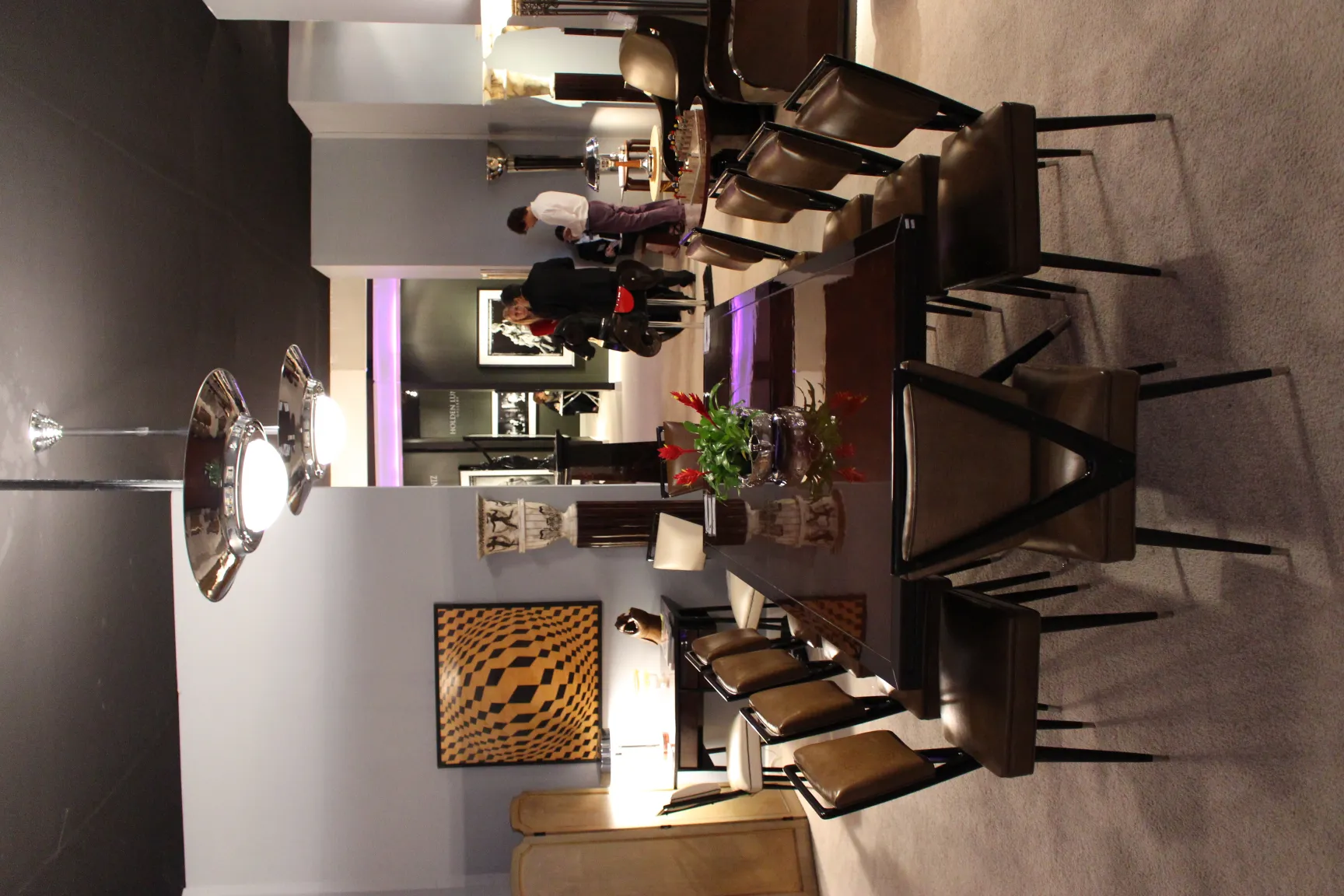 table with antique marquetry and chairs in a decorative setting