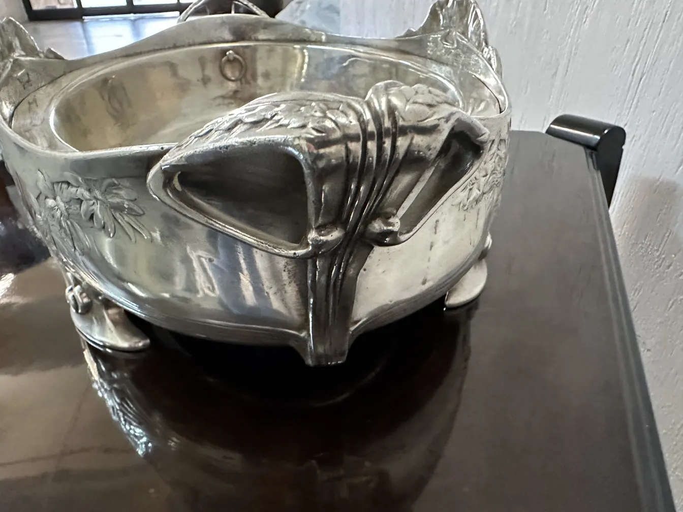 antique centerpiece in an elegant setting, visible decorative details