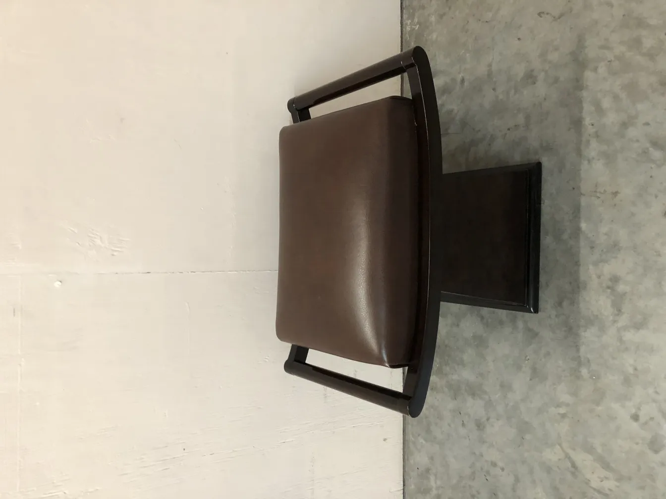 antique stool with elegant design and backrest, neutral background