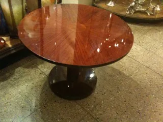 antique round small table in a cozy setting