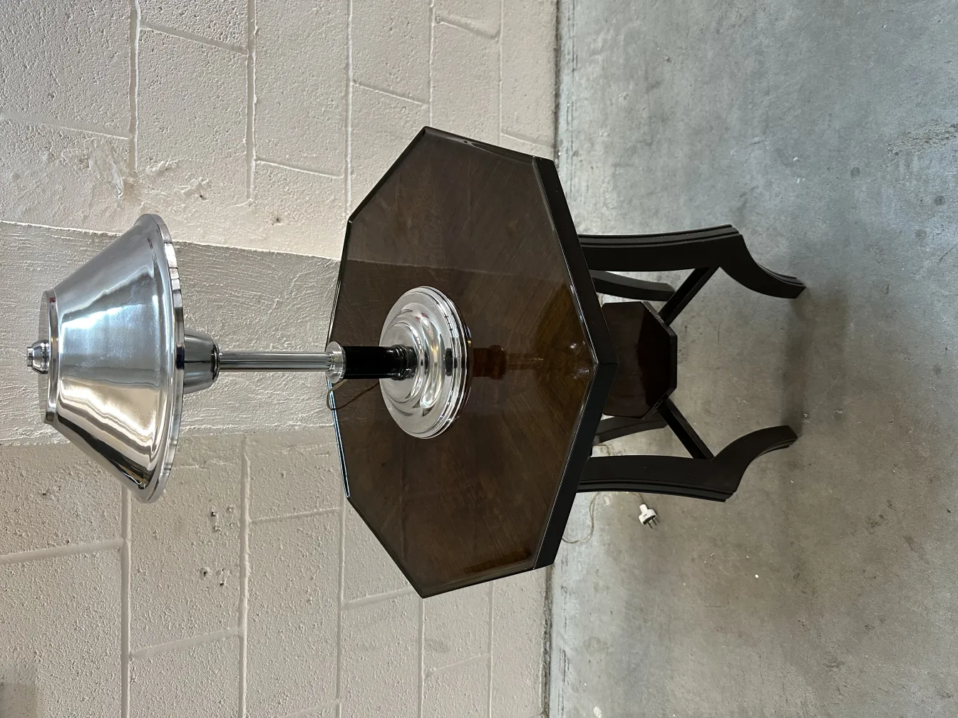 antique octagonal small table with silver lamp