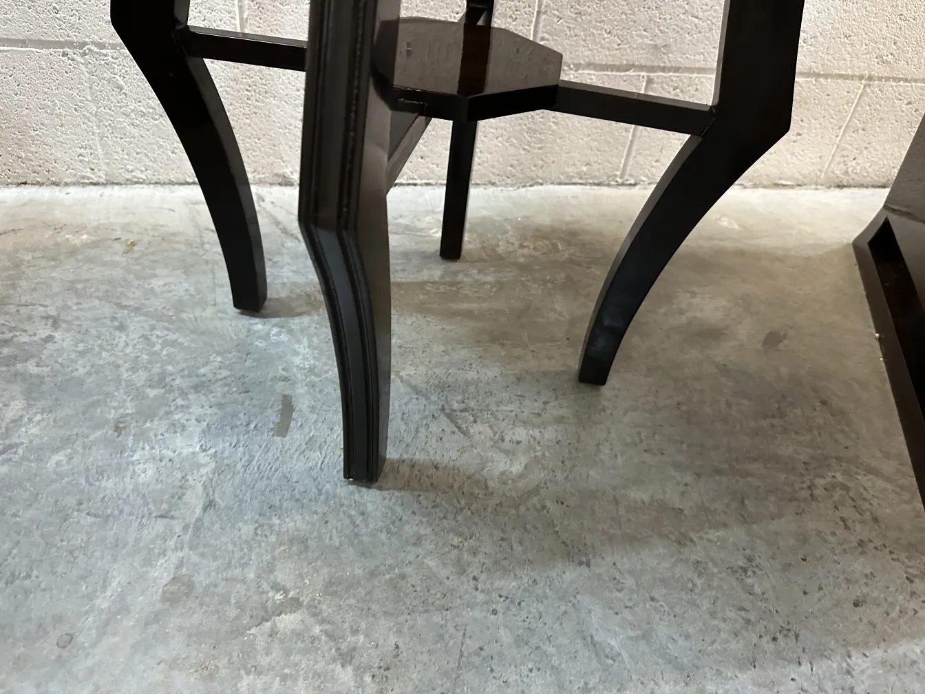 antique small table with curved, elegant legs