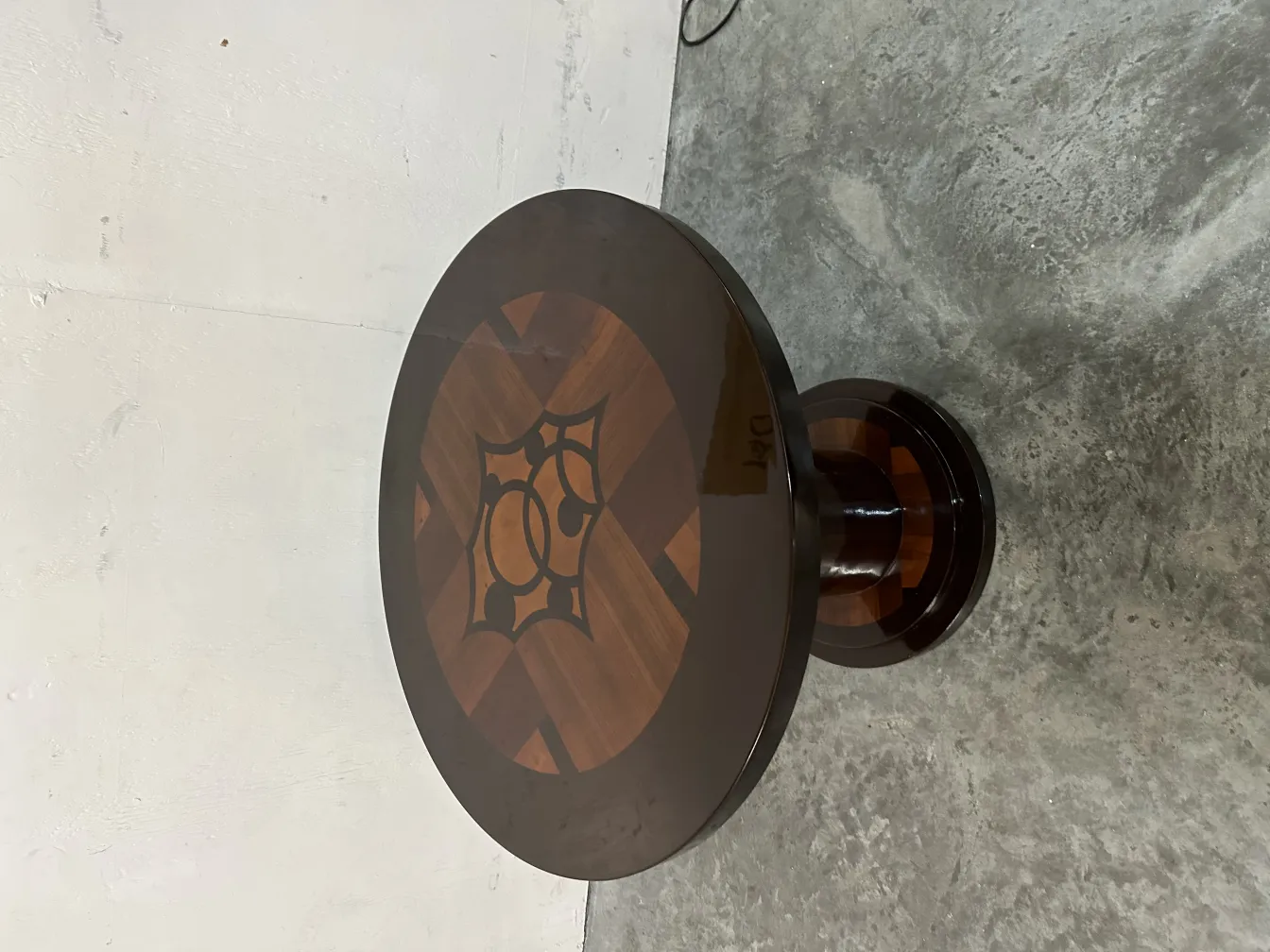 Antique round small table with decorative details