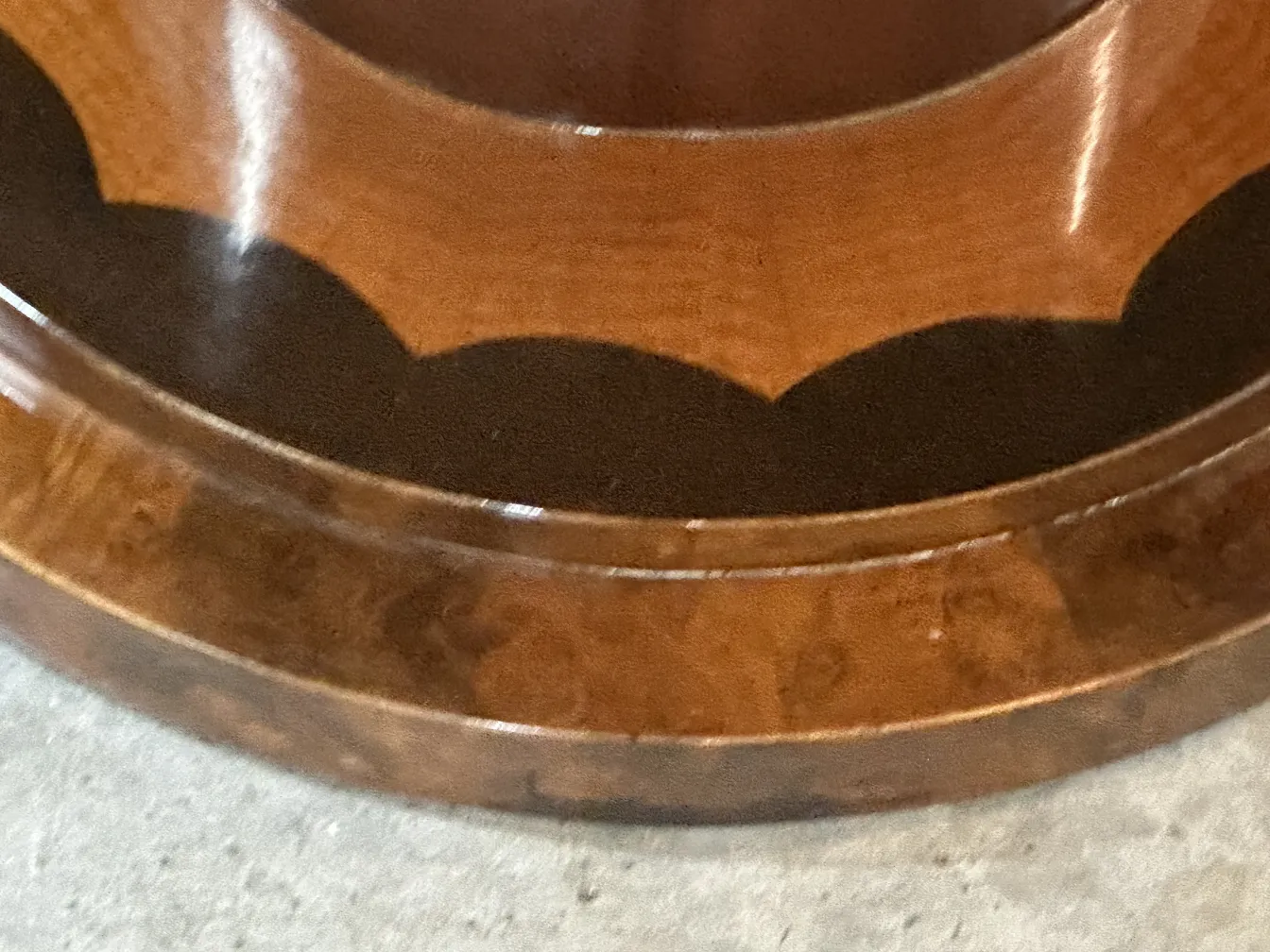 details of an antique small table with ornate design