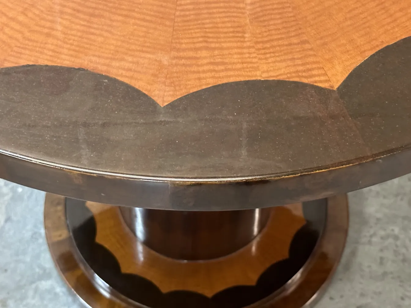 antique small table featuring elegant curved design