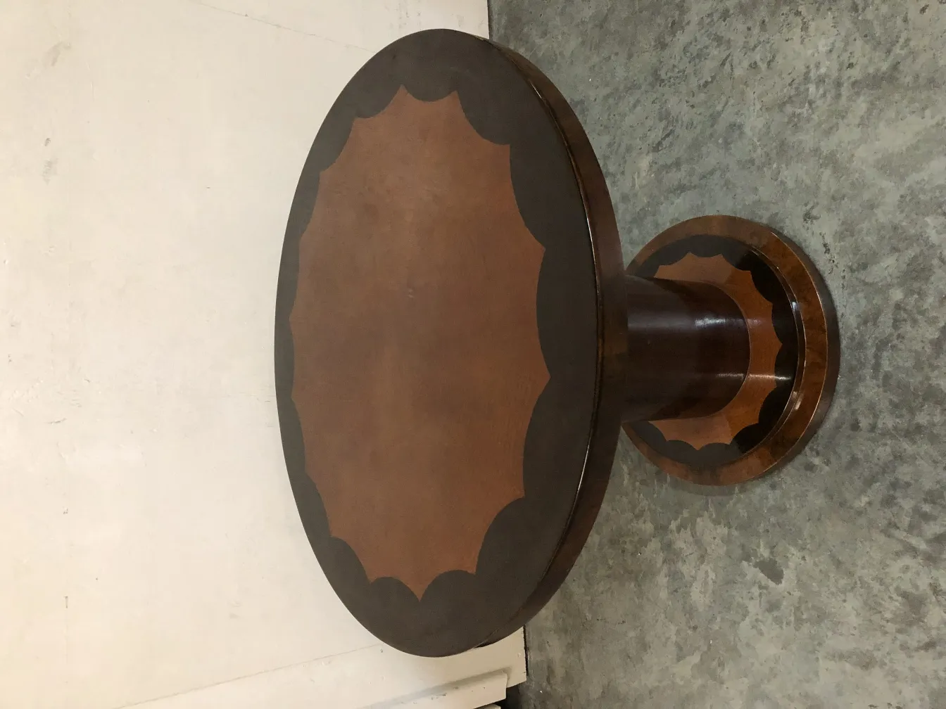 antique round table with decorative base