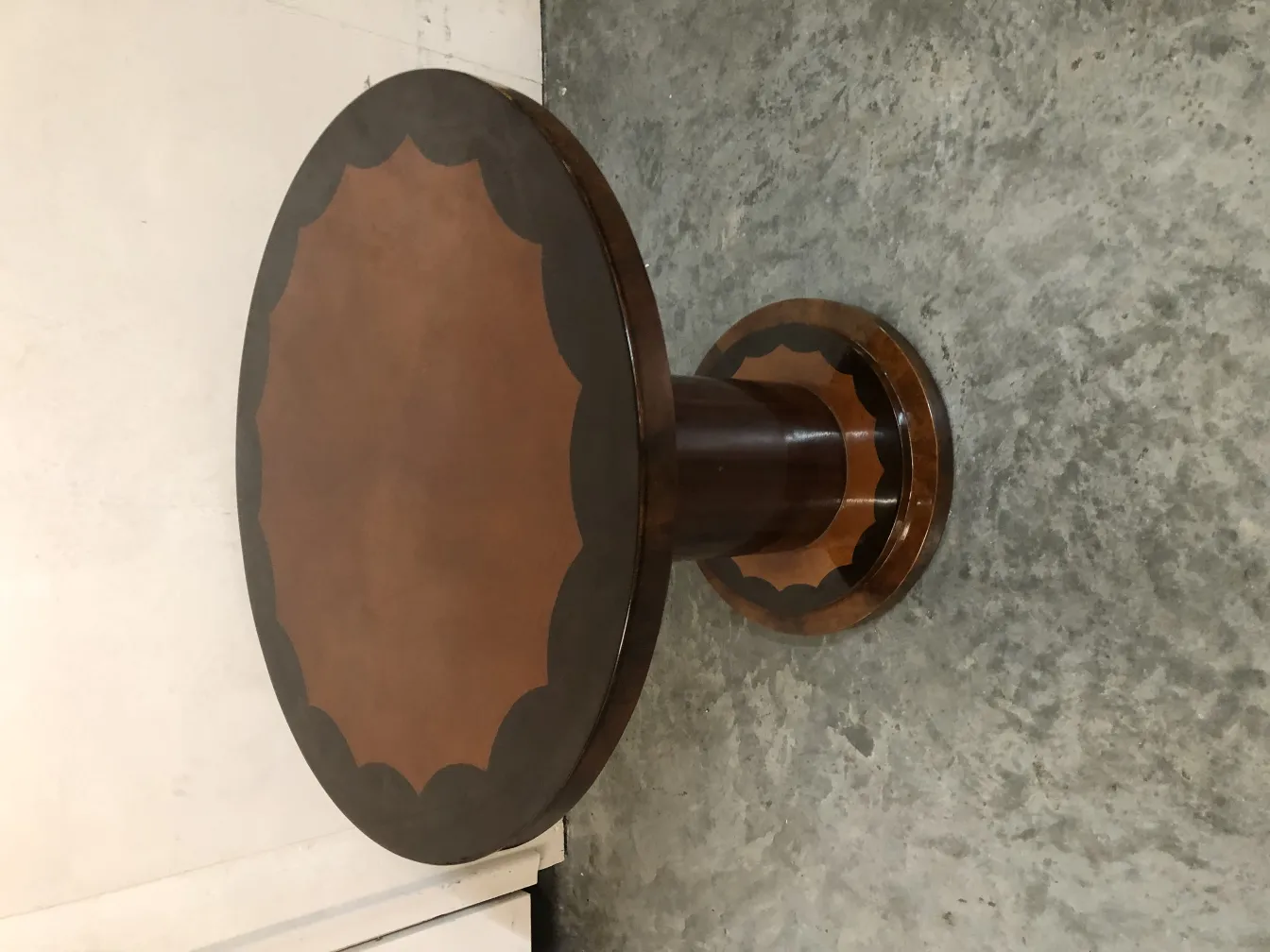antique small table with decorative round top