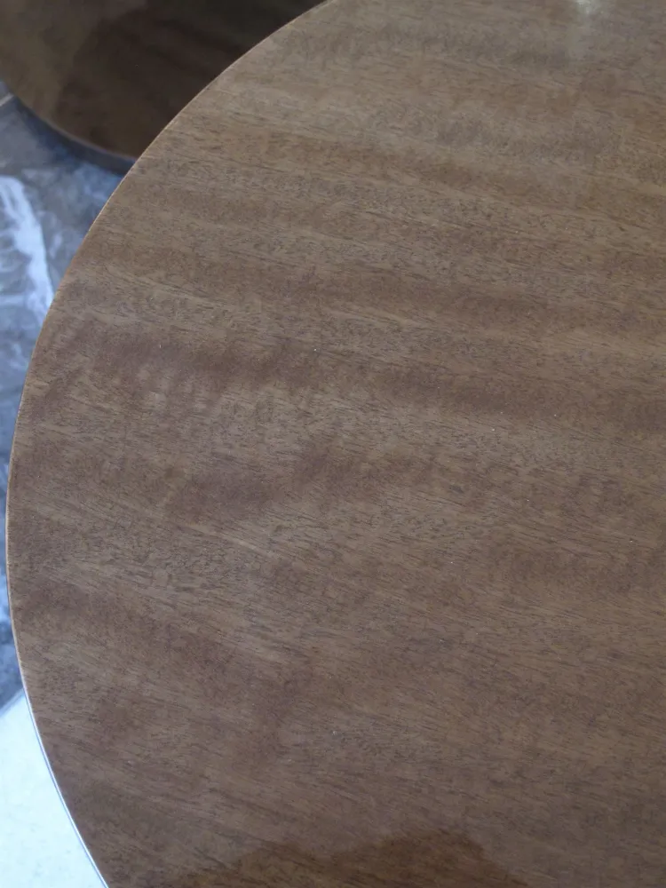 antique round small table with a smooth, simple finish