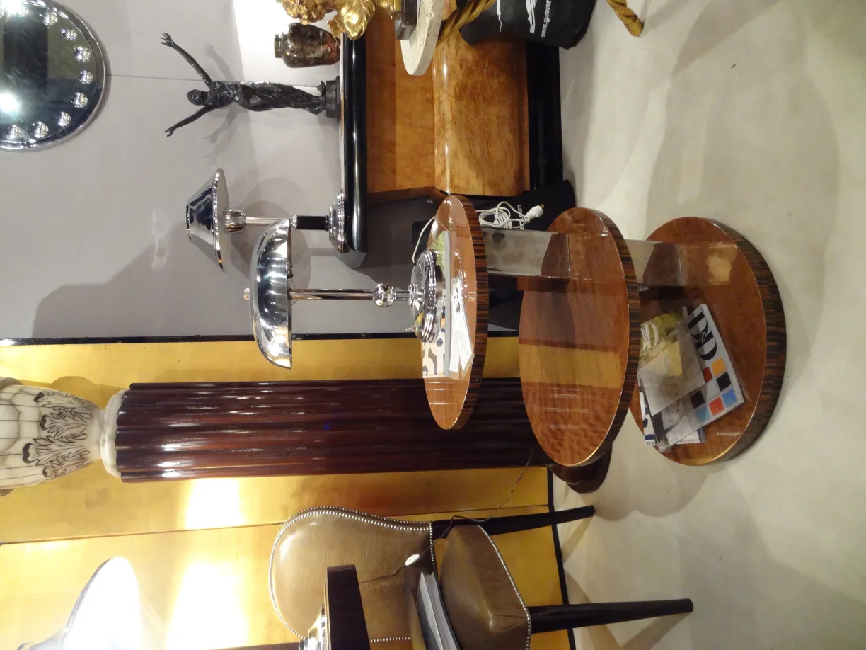 Antique round small table in an elegant setting