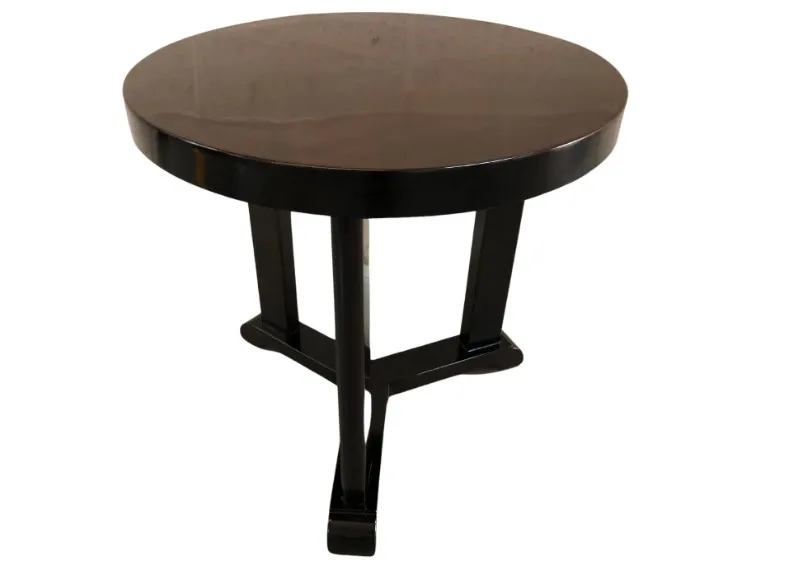 petite table ronde antique de couleur sombre avec base solide